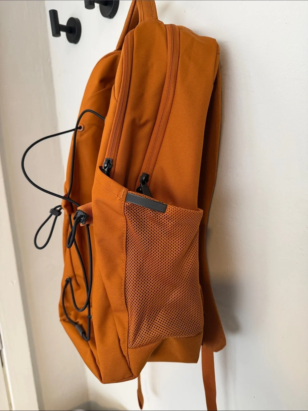 North Face Jester Backpack in burnt orange & black accents Excellent Condition